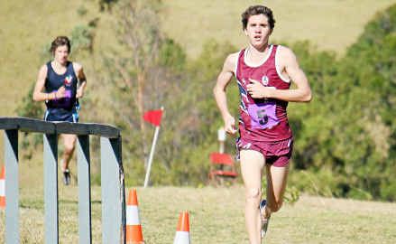 NATIONAL GLORY: Gympie long distance running talent Jack Curran (above main) runs to victory at the National Cross Country Titles late last year. (Inset) Shaun Lee dominates the field during a Zone Athletics Carnival at Albert Park. Both runners are headed to Sydney next week in the hunt for medals. NATIONAL GLORY: Gympie long distance running talent Jack Curran (above main) runs to victory at the National Cross Country Titles late last year. (Inset) Shaun Lee dominates the field during a Zone Athletics Carnival at Albert Park. Both runners are headed to Sydney next week in the hunt for medals.